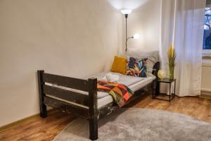 Postel nebo postele na pokoji v ubytování Krumpes Quarters + 1 fotografie