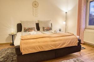 Postel nebo postele na pokoji v ubytování Krumpes Quarters