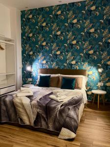 Voodi või voodid majutusasutuse guest house Napul'è toas