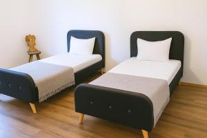 Postel nebo postele na pokoji v ubytování Craftsmen Home Handwerker Heimat + 3 fotografie