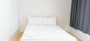 Ένα ή περισσότερα κρεβάτια σε δωμάτιο στο Snap inn Sukhumvit 1 สแนป สุขุมวิท ซอย 1 - Gold +18 φωτογραφίες