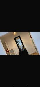 a picture of a mirror in a room at Apartament ultracentral in Craiova
