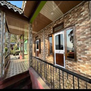 Balkón nebo terasa v ubytování Peshok Subba Homestay By StayApart