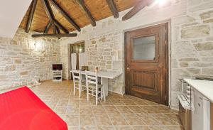 TV a/nebo společenská místnost v ubytování Villa Poseidon Suite