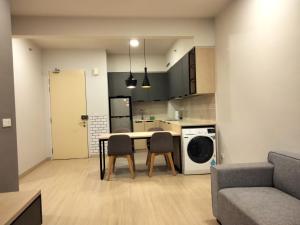 Кухня или мини-кухня в Oneiro Windmill Upon Hills
