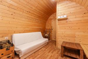 Ένα ή περισσότερα κρεβάτια σε δωμάτιο στο Kopų ramybė