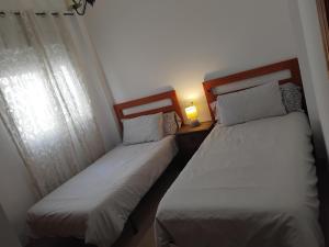 En eller flere senge i et værelse på Calle Cártama