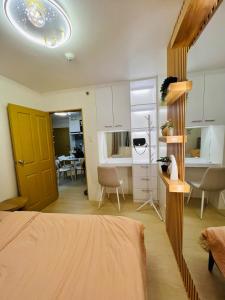 Photo de la galerie de l'établissement Bright & Cozy 2BR - Sea view at Marina Spatial, à Piapi