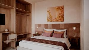 Ένα ή περισσότερα κρεβάτια σε δωμάτιο στο Marton Turisme de Interior