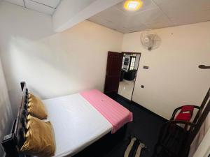 Ένα ή περισσότερα κρεβάτια σε δωμάτιο στο Island Roots