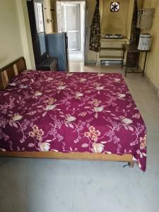 Ένα ή περισσότερα κρεβάτια σε δωμάτιο στο Nitin pg