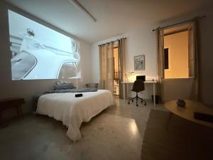 Ένα ή περισσότερα κρεβάτια σε δωμάτιο στο The Small House Coliving