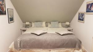 Postel nebo postele na pokoji v ubytování Villa Sonnenschein Makkum