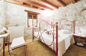 Postel nebo postele na pokoji v ubytování Villa Poseidon Executive Suite + 18 fotografií