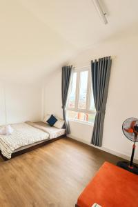 Postel nebo postele na pokoji v ubytování Cao Nguyên Đỏ Homestay - BBQ - Coffee + 37 fotografií