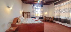 Et opholdsområde på Villa Katerina - Paje + 8 billeder