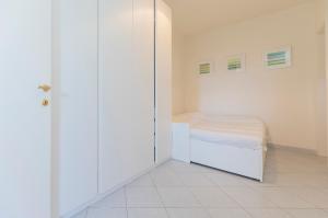 Ένα ή περισσότερα κρεβάτια σε δωμάτιο στο Casa di Cosimo - HelloElba