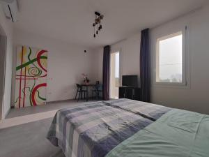 Postel nebo postele na pokoji v ubytování Agriturismo Pentafora