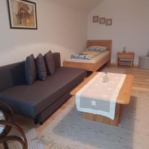 Ένα ή περισσότερα κρεβάτια σε δωμάτιο στο Ferienhaus Renate