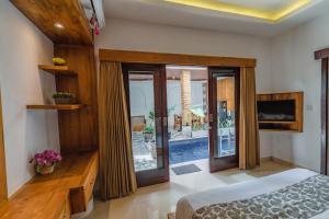 Μια τηλεόραση ή/και κέντρο ψυχαγωγίας στο Nalin Bali Villas