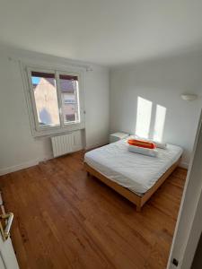 Postel nebo postele na pokoji v ubytování Le toit des volcans