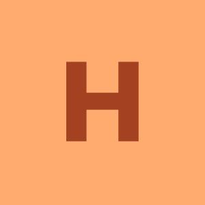 Hotel Comfy Lodge في Dargai: علامة برتقالية عليها الحرف h