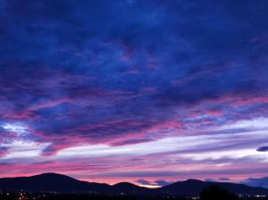 a colorful sky with mountains in the background at Villa Panorama in Żywiec