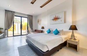 Ένα ή περισσότερα κρεβάτια σε δωμάτιο στο Peridot Golden Sand +22 φωτογραφίες