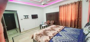 Postel nebo postele na pokoji v ubytování Hotel New View Guest House