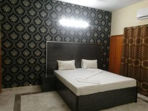 Postel nebo postele na pokoji v ubytování Hotel New View Guest House