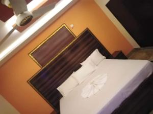 Postel nebo postele na pokoji v ubytování Hotel New View Guest House