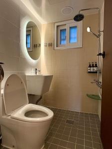 Un baño de Hongdae, YG Entertainment Unique villa