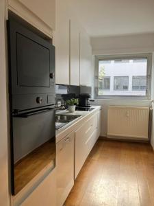 Η κουζίνα ή μικρή κουζίνα στο RS10 One-Bedroom Apartment