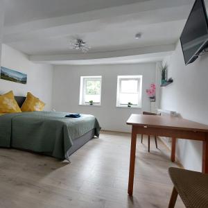 Postel nebo postele na pokoji v ubytování Hotel Silonce Bilstein + 28 fotografií