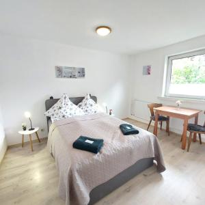 Ένα ή περισσότερα κρεβάτια σε δωμάτιο στο Hotel Silonce Bilstein