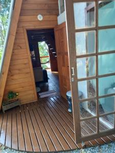 a view of the inside of a tiny house at Chalé Premium com jacuzzi privativa Florianópolis in Florianópolis