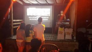 a group of people watching a presentation on a stage at ZEcamping 3 étoiles animé animaux acceptés familial piscine couverte in Avrillé +77 photos
