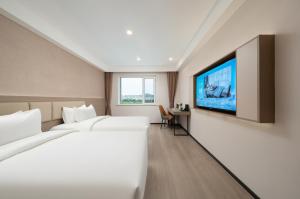 Φωτογραφία από το άλμπουμ του Ward Smart Hotel Jinan Yaogu Weizhen Business Port Branch 