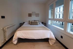 En eller flere senge i et værelse på Rental Room PZ4 + 4 billeder