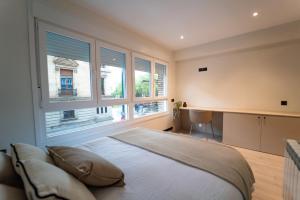 En eller flere senge i et værelse på Rental Room PZ4