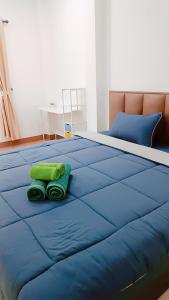 Ένα ή περισσότερα κρεβάτια σε δωμάτιο στο Pai Baan Family