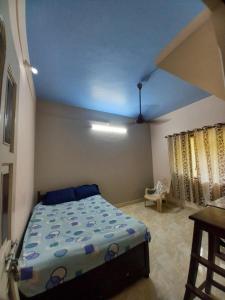 Ένα ή περισσότερα κρεβάτια σε δωμάτιο στο Beachglow