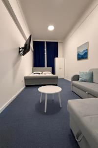 Χώρος καθιστικού στο Royal Blue Central Point