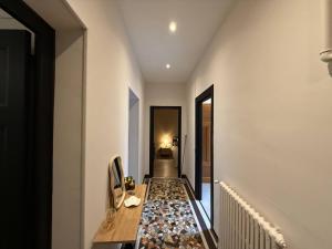 Μια τηλεόραση ή/και κέντρο ψυχαγωγίας στο L'Élégance – Cosy & Chill