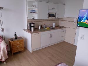 Kuchyň nebo kuchyňský kout v ubytování Studioappartement Wegg Wilhelmstraße