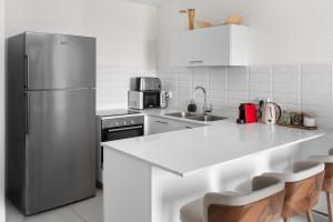 Η κουζίνα ή μικρή κουζίνα στο Stylish 1-Bed Flat at Jtower