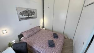 Ένα ή περισσότερα κρεβάτια σε δωμάτιο στο Apartment Dante