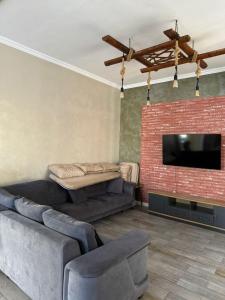 TV a/nebo společenská místnost v ubytování Sea Key Villa + 2 fotografie