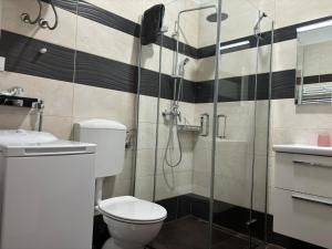 Ένα μπάνιο στο Apartment Dante +26 φωτογραφίες