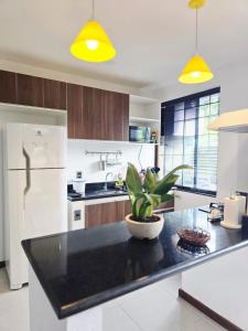 Køkken eller tekøkken på Casa Pimenta - Apto aconchegante perto da rua do Mucugê